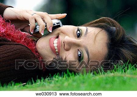 Hispanic girl with phone View Large Photo Image Stock Image - Hispanic girl with phone. Fotosearch