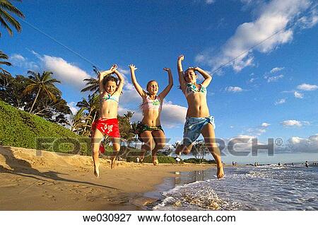 Jumping beach girls View Large Photo Image Stock Photo - Jumping beach girls. Fotosearch