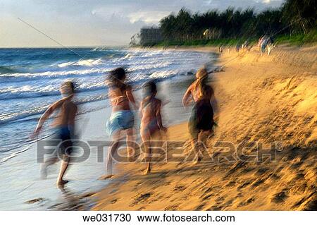 Kids running at the beach View Large Photo Image Stock Image - Kids running at the beach. Fotosearch