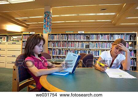 Kids studying in library View Large Photo Image Picture - Kids studying in library. Fotosearch