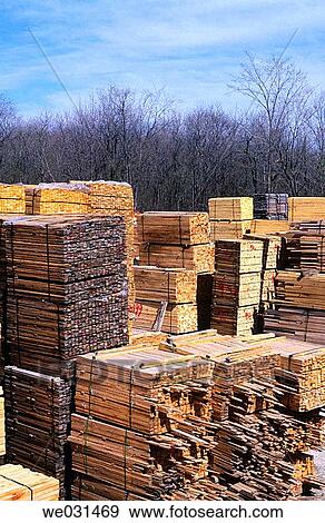 Lumberyard with piles of various stacked lumber View Large Photo Image Stock Photo - Lumberyard with piles of various stacked lumber. Fotosearch