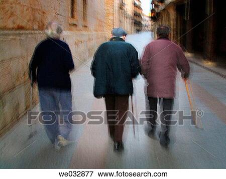 Men walking in El Burgo de Osma. Soria province, Castilla-Le? n, Spain View Large Photo Image Stock Photo - Men walking in El Burgo de Osma. Soria province, Castilla-Le? n, Spain. Fotosearch