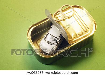 Stock Photo - Miniature car in tin can. Fotosearch
