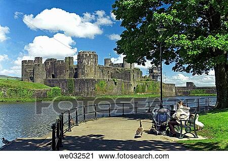 Mother with pram, Caerphilly castle, mid glamorgan, Wales, GB View Large Photo Image Stock Image - Mother with pram, Caerphilly castle, mid glamorgan, Wales, GB. Fotosearch