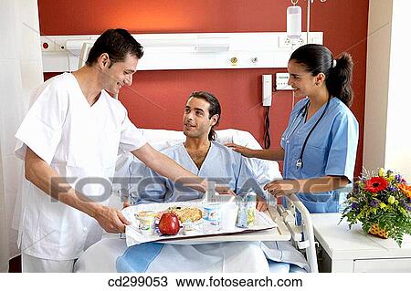 Nurses and patient in hospitalization View Large Photo Image Stock Image - Nurses and patient in hospitalization. Fotosearch
