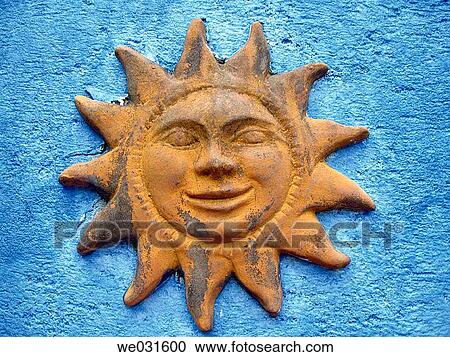 Ornament representing the Sun on a blue wall. Antigua. Guatemala. View Large Photo Image Stock Image - Ornament representing the Sun on a blue wall. Antigua. Guatemala.. Fotosearch