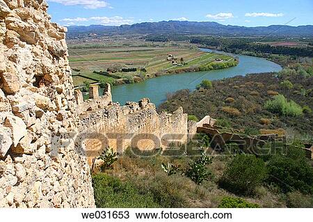 Overview of Miravet Castle and Ebre river. Tarragona province. Catalunya. Spain View Large Photo Image Stock Image - Overview of Miravet Castle and Ebre river. Tarragona province. Catalunya. Spain. Fotosearch