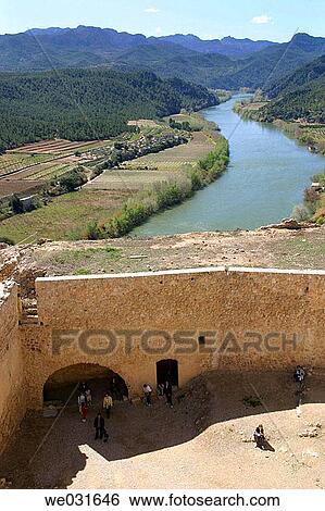 Overview of Miravet Castle and Ebre river. Tarragona province. Catalunya. Spain View Large Photo Image Stock Photograph - Overview of Miravet Castle and Ebre river. Tarragona province. Catalunya. Spain. Fotosearch