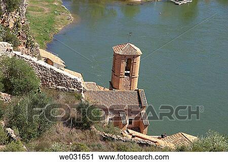 Overview of Miravet parish church and Ebre river. Tarragona province. Catalunya. Spain View Large Photo Image Stock Image - Overview of Miravet parish church and Ebre river. Tarragona province. Catalunya. Spain. Fotosearch