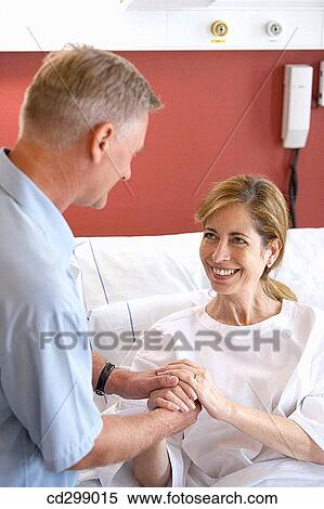 Patient and relative in hospitalization View Large Photo Image Stock Photography - Patient and relative in hospitalization. Fotosearch