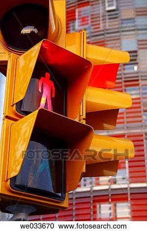 Stock Image - Red light in front of Agbar Tower by Jean Nouvel, Barcelona. Catalonia, Spain. Fotosearch