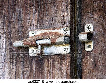 Rusted bolt on an old shed door View Large Photo Image Stock Photo - Rusted bolt on an old shed door. Fotosearch