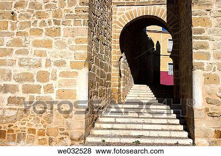 Stock Photo - Sevilla town gate (aka Arco de la Rosa), Marchena. Sevilla province, Andalusia, Spain. Fotosearch