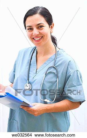 Smiling young female medical professional View Large Photo Image Picture - Smiling young female medical professional. Fotosearch