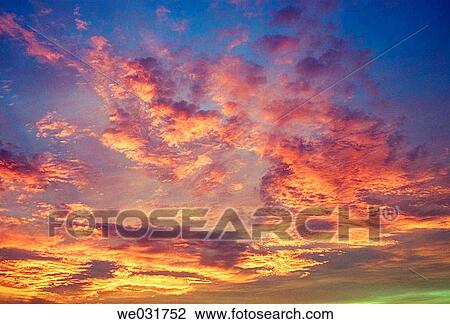 Stock Image - Sunrise clouds. Fotosearch