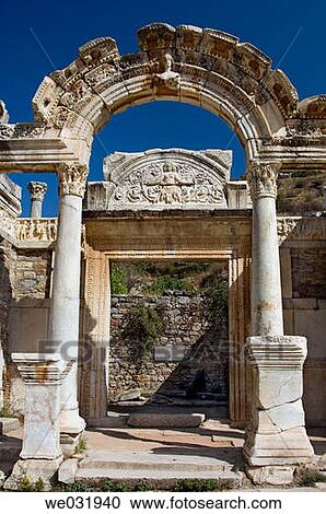 Stock Image - The facade of Hadrian's Temple, Hadrian's Arch facing Curetes Street in Ephesus, Turkey.. Fotosearch