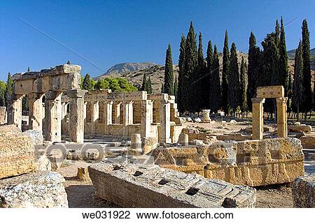 Stock Image - The main street or Frontinus Street in the ruins of Hierapolis, Turkey.. Fotosearch