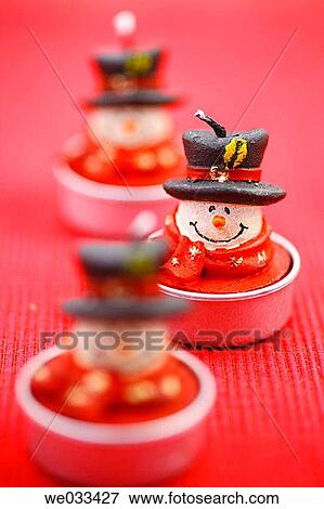 Three Christmas tea candles View Large Photo Image Stock Photo - Three Christmas tea candles. Fotosearch