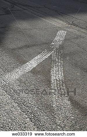 Tire tracks on asphalt roadway. View Large Photo Image Stock Photo - Tire tracks on asphalt roadway.. Fotosearch