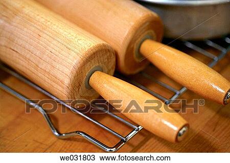 Two bakers rolling pins View Large Photo Image Stock Image - Two bakers rolling pins. Fotosearch