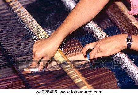 Weaving. Loom. Bima island. Sumbawa. Indonesia. View Large Photo Image Stock Photography - Weaving. Loom. Bima island. Sumbawa. Indonesia.. Fotosearch