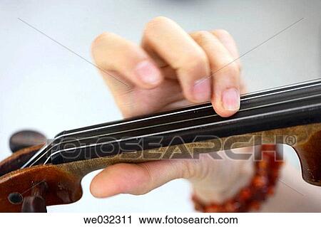 Woman's fingers on neck of violin View Large Photo Image Stock Image - Woman's fingers on neck of violin. Fotosearch