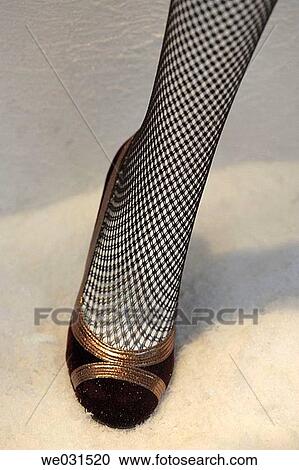 Womans foot in fishnet stockings View Large Photo Image Stock Image - Womans foot in fishnet stockings. Fotosearch