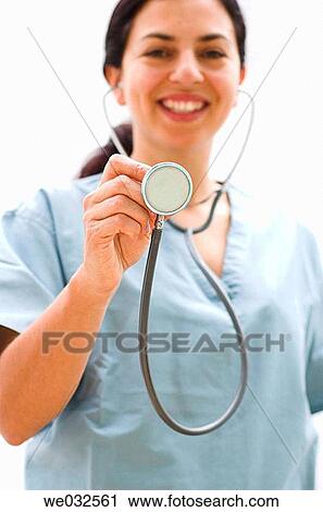 Young female medical professional with stethoscope View Large Photo Image Stock Image - Young female medical professional with stethoscope. Fotosearch