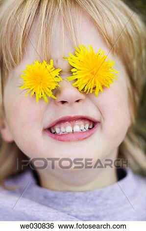 Young girl (3 yrs) with dandelions over eyes View Large Photo Image Stock Photograph - Young girl (3 yrs) with dandelions over eyes. Fotosearch