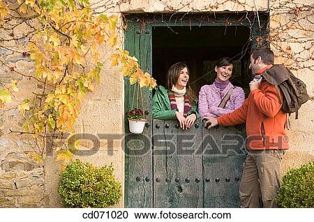 Stock Image - 30's, chat, 20's. Fotosearch