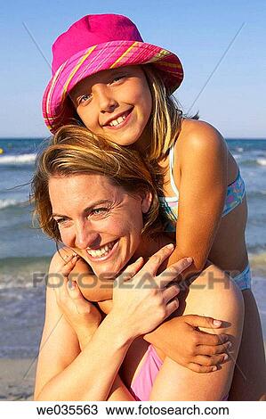 Stock Image - affection, bond, beach, 30's. Fotosearch