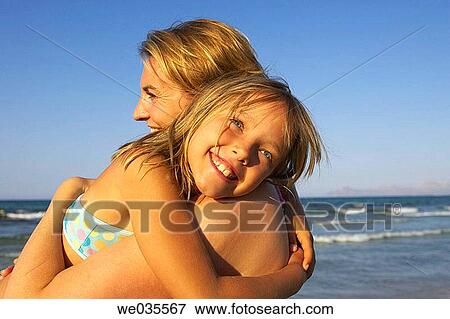 affection, bond, beach, 30's View Large Photo Image Stock Photo - affection, bond, beach, 30's. Fotosearch