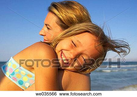 affection, bond, beach, 30's View Large Photo Image Stock Photograph - affection, bond, beach, 30's. Fotosearch