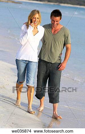 affection, bond, beach, barefoot, 30's View Large Photo Image Picture - affection, bond, beach, barefoot, 30's. Fotosearch
