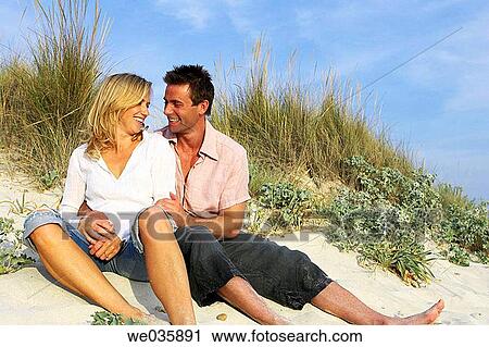 affection, bond, beach, barefoot, 30's View Large Photo Image Stock Image - affection, bond, beach, barefoot, 30's. Fotosearch
