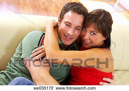 Stock Image - affection, bonding, bond, at-home, 30's. Fotosearch