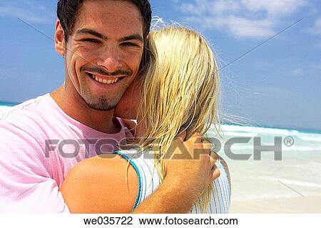 Stock Image - affection, bonding, bond, beach, 30's. Fotosearch