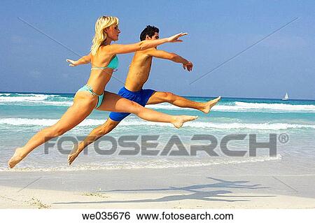 agile, beach, bathing-suit, agility, 30's View Large Photo Image Stock Photograph - agile, beach, bathing-suit, agility, 30's. Fotosearch