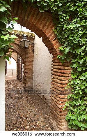Stock Photography - Alley in the Jewish quarter of C? rdoba. Andalusia, Spain. Fotosearch