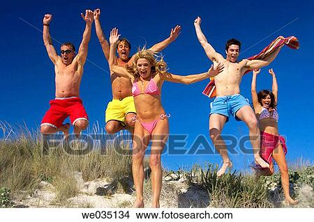 amusement, beach, bathing-suit, Arms raised, 30's View Large Photo Image Picture - amusement, beach, bathing-suit, Arms raised, 30's. Fotosearch