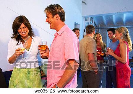 Stock Photography - amusement, chat, at-home, 30's. Fotosearch