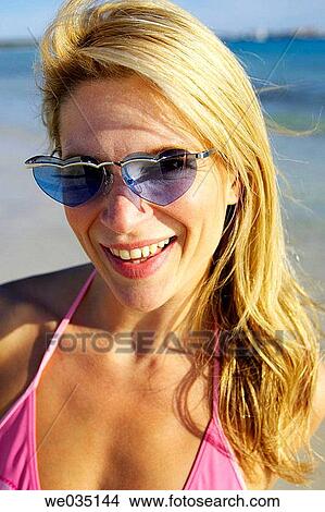 Picture - amusing, blond, beach, 30's. Fotosearch