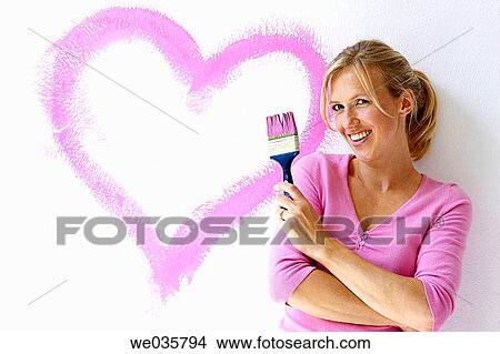 amusing, brush, blond, 30's View Large Photo Image Picture - amusing, brush, blond, 30's. Fotosearch