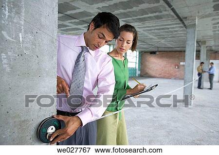Stock Photo - architect, businesspeople, businessman, business, 30's. Fotosearch