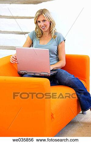 Stock Photograph - at-home, blond, 30's. Fotosearch