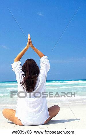 back view, blue, beach, Arms raised View Large Photo Image Stock Image - back view, blue, beach, Arms raised. Fotosearch