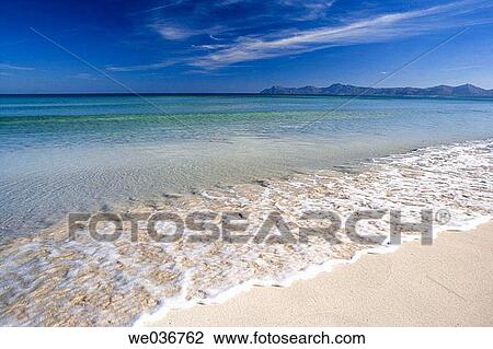 Bah? a de Alc·dia. Muro beach. Cabo Ferrutx at the back. Mediterranean sea. Balearic Islands. Spain. View Large Photo Image Stock Image - Bah? a de Alc·dia. Muro beach. Cabo Ferrutx at the back. Mediterranean sea. Balearic Islands. Spain.. Fotosearch