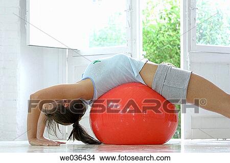 balance, brunette, ball, 30's View Large Photo Image Picture - balance, brunette, ball, 30's. Fotosearch