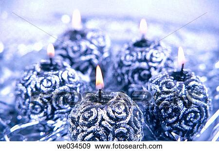 Stock Photo - ball, bauble, burning, candle, Christmas, Christmas decoration. Fotosearch