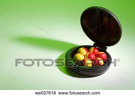 Balls in compact case View Large Photo Image Stock Photo - Balls in compact case. Fotosearch